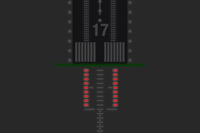 Red terminating bars approach light system